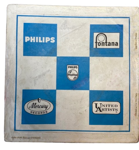 Cette rare pochette de Vinyle présentait d'importantes traces de stylo, d'encre et de tampon à l'encre
